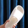 04a9f75c3c5164512ed11482d79ac91aa97bbec2be5dda08936b3a482ba6a768.jpg Minimalist Single Band Slides Shower Bathroom Slippers Comfy Cushioned Thick Sole