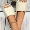 2cdbee4126e81561e9481552cc53a8135150c32a82b1556f7045d805cd4a42f1.jpg Women Single Band Slippers, Minimalist Beige EVA Slides For Indoor