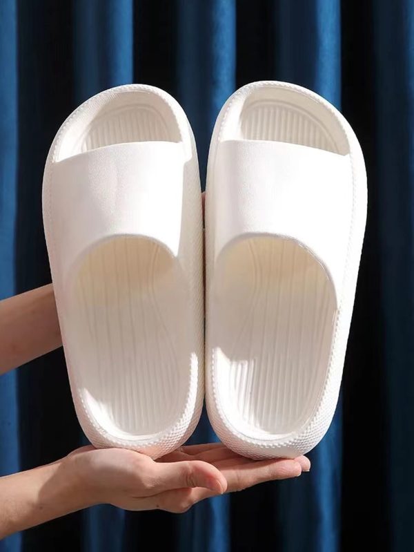 dc09994a8370db04090e23ac2eff43486c7e2eca9cc4ad2074ff9d36d07cfa0e.jpg Minimalist Single Band Slides Shower Bathroom Slippers Comfy Cushioned Thick Sole