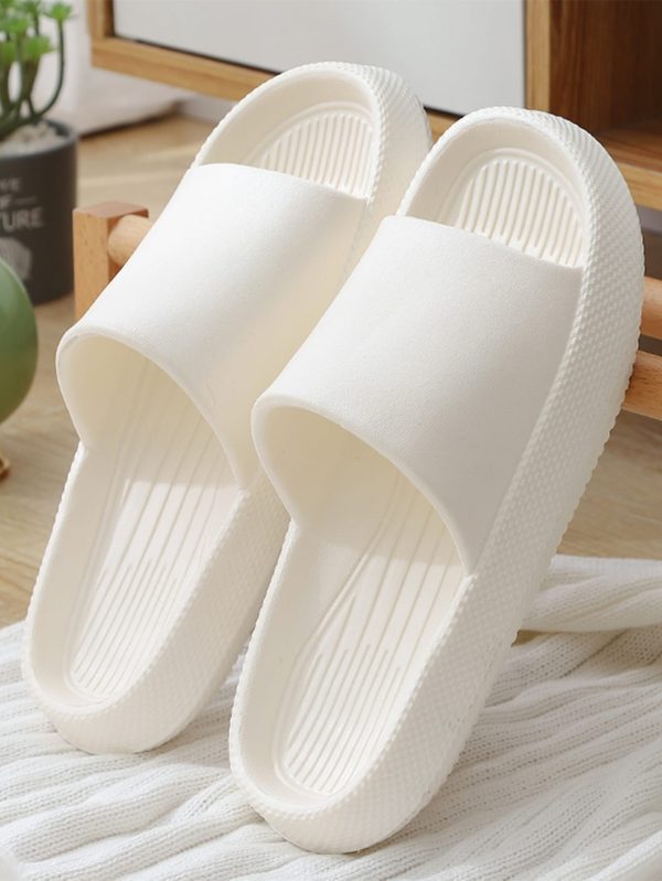 fad141fa8044492d066ef3854653c3a552c13902c7fe09b377845f549ac8e112.jpg Minimalist Single Band Slides Shower Bathroom Slippers Comfy Cushioned Thick Sole